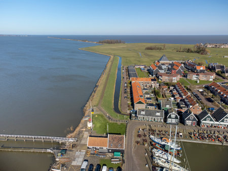 Aerial view on small Dutch town Marken with wooden houses located on former island in North Holland, Netherlands in sunny dayのeditorial素材