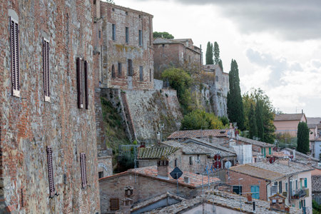 View on houses and walls of old town Montepulciano in autumn, Tuscany, Italyのeditorial素材