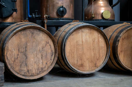 Production of sweet cassis creme liquor from ripe black currant berries, distillation and maturation...