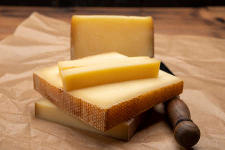 Swiss cheese collection, gruyere cheese made from unpasteurized cow's milk close upの写真素材