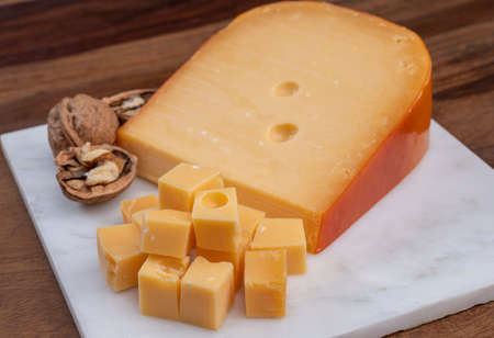 Dutch hard cow milk old yellow cheese from Gouda