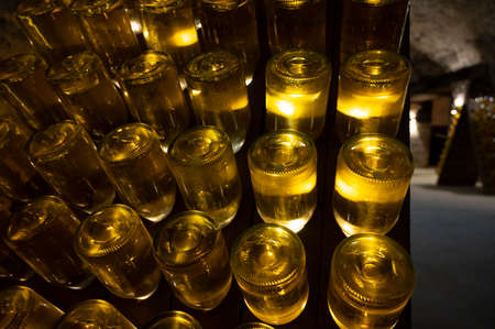 Sparkling white and rose wine production by traditional method in underground cellars in Vienna, Austriaの写真素材