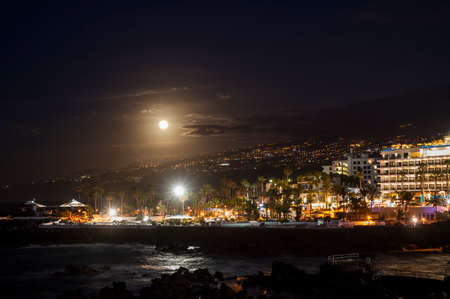 Walking at night in Puerto de la Cruz, Tenerife, Canary islands in winterの写真素材