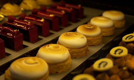 Austrian desserts, different types of chocolate and fruit cakes in traditional bakery cafe in...