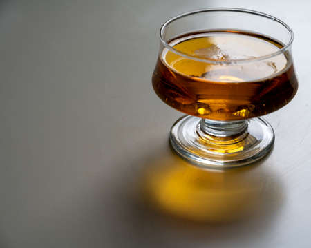 One glass of apple cider drink on white table, Normandy, Franceの写真素材