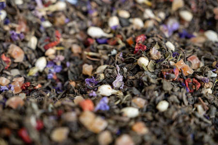 Blended black leaf dry tea with aromatic flowers, spices in tea shop in Granada, Andalusia, Spainの写真素材