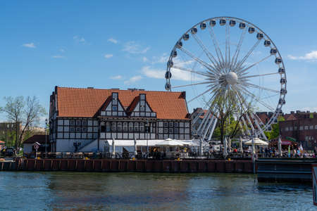 Colorful facades and buildings in old central part of Gdansk city, Poland in sunny dayの写真素材