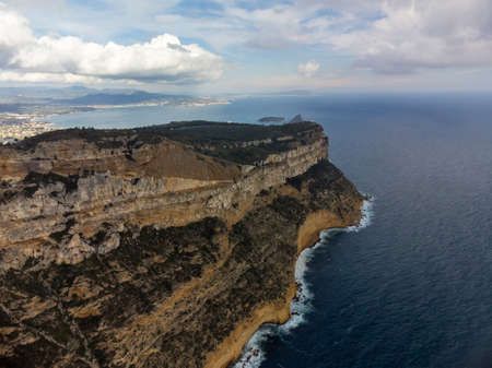 Touristic route D141 road from La Ciotat to Cassis, panoramic aerial view on blue sea, limestone's cliffs and green pine forest, vacation in Provence, Franceの写真素材