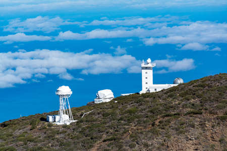 Panoramic view on La Palma island from highest mountain range Roque de los muchachos, sunny day above clouds, Canary islands, Spainの写真素材