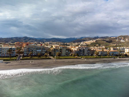 Aerial panoramic view on coastline in Torrox Costa, Costa del Sol, small touristic town between Malaga and Nerja, Andalusia, Spain. Overwinter in Spain.の写真素材