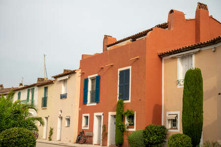 Colorful houses in Port Grimaud, village on Mediterranean sea with yacht harbour, Provence, summer vacation in Franceの写真素材