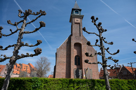 Walking in historical Dutch fisherman's village in North-Holland, Enkhuizen, Netherlands in springの写真素材