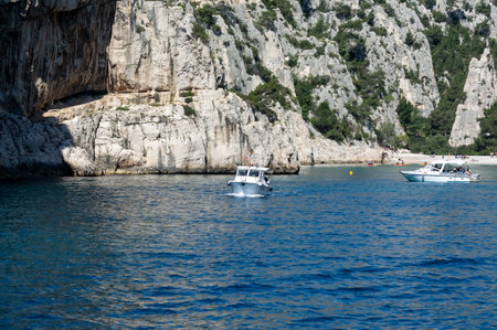 View on Calanque d'En-vau with white sandy beach near Cassis, boat excursion to Calanques national...