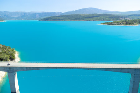 Aerial view on blue lake Sainte-Croix-du-Verdon, bridge, forest, cliffs, tourists destination in Franceの写真素材