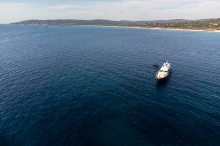 Aerial view on legendary Pampelonne beach near Saint-Tropez and blue sea, summer vacation on white sandy beaches of French Riviera, Franceの写真素材