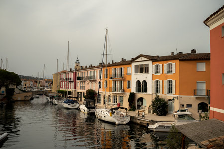 Colorful houses in Port Grimaud, village on Mediterranean sea with yacht harbour, Provence, summer vacation in Franceのeditorial素材