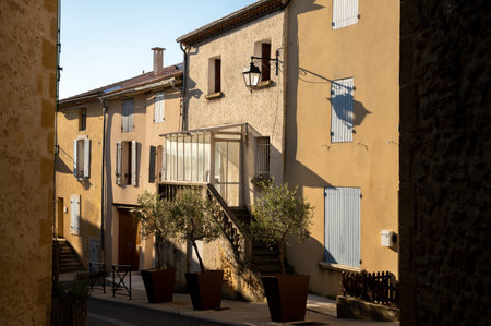 VIew on medieval buildings in sunny day, vacation destination, famous wine making village Chateauneuf-du-pape in Provence, Franceのeditorial素材
