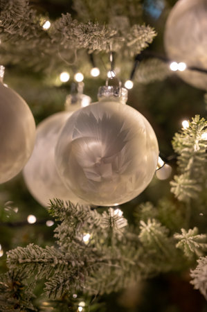 Christmas tree decorated is festivily decorated with vintage colorful balls, garlands and toys close up, Christmas background, winter holidaysの写真素材