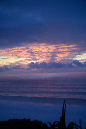 Magoito Beach on Atlantic ocean at sunset, beautiful sandy beach on Sintra coast, Lisbon district, Portugal, part of Sintra-Cascais Natural Park with natural points of interestの写真素材