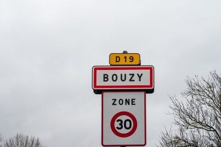Low season in winter in Champagne wine making region near Epernay, Champagne, France. Road signs and places of destinations, Gran Cru village Bouzy, tourists route of Champagneの写真素材