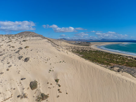 Aerial view on sandy dunes and turquoise water of Sotavento beach, Costa Calma, Fuerteventura, Canary islands, Spain in winterの写真素材