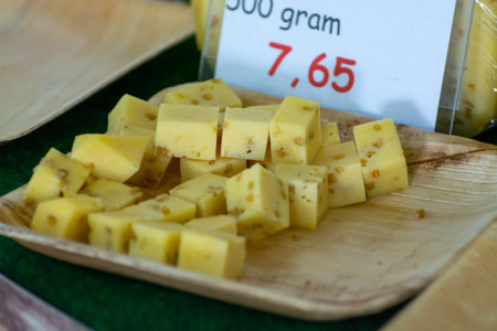 Tasting of different cheeses in Dutch cheese farm shopの写真素材