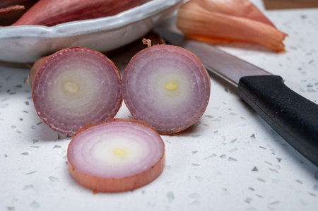 French long pink shallots grappe onion from Brittany, France close upの写真素材