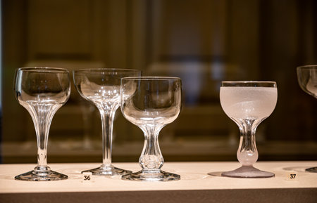 Old and vintage collection of empty wine or champagne bubbles wine glassesの写真素材