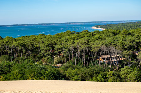 View of Dune of Pilat tallest sand dune in Europe located in La Teste-de-Buch in Arcachon Bay area, France southwest of Bordeaux along France's Atlantic coastline in sunny dayの写真素材
