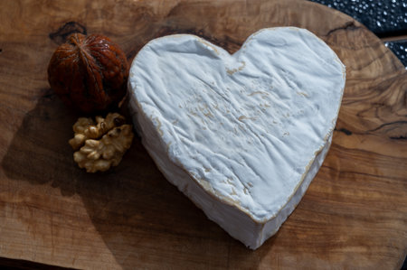 Cheese collection, French cheese from Normandy region, heart-shaped Neufchatel from farm shop close upの写真素材