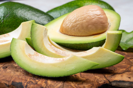 Green ripe avocado fruits from organic avocado plantation - healthy vegan and vegetarian foodの写真素材