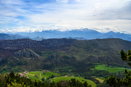 Traveling by car to mountain view points in Asturias, North of Spain, view on Picos de Europa mountain rangeの写真素材