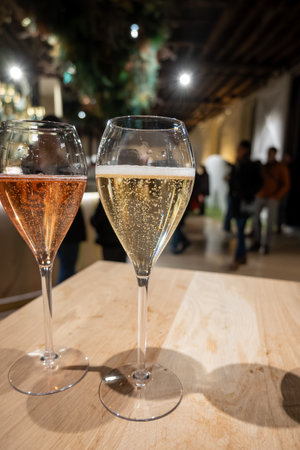 Glass with little bubbles, tasting of sparkling wine champagne on winter festival in December, Avenue de Champagne, Epernay, Champagne region, Franceの写真素材