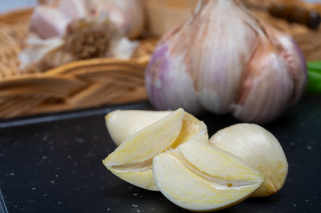 Cooking with dried French garlic. Red garlic. Aromatic violet garlic.の写真素材