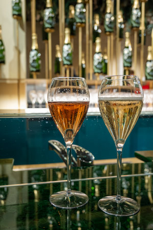 Glass with little bubbles, tasting of sparkling wine champagne on winter festival in December, Avenue de Champagne, Epernay, Champagne region, Franceの写真素材