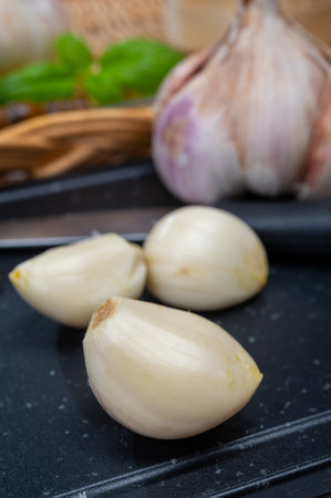 Cooking with dried French garlic. Red garlic. Aromatic violet garlic.の写真素材