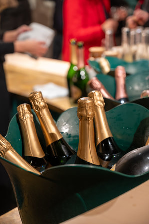 Bottles of cold sparkling wine champagne on winter weekend festival in December on Avenue de Champagne, Epernay, Champagne region, Franceの写真素材