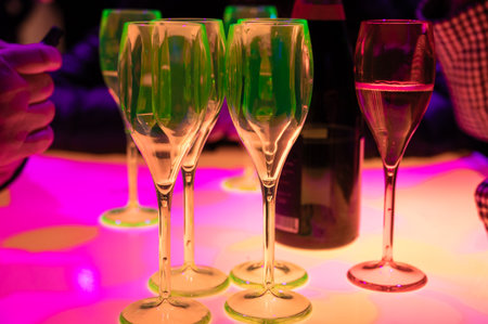 Visitors drinking of sparkling wine champagne on outdoor winter festival in December on Avenue de Champagne, Epernay, Champagne region, Franceの写真素材