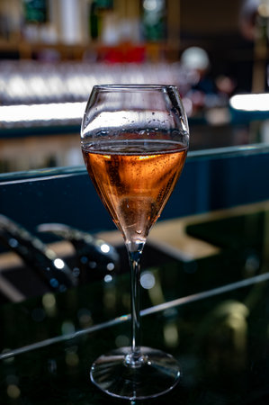 Glass with little bubbles, tasting of sparkling wine champagne on winter festival in December, Avenue de Champagne, Epernay, Champagne region, Franceの写真素材