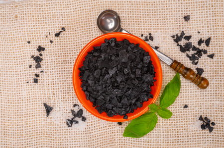 Black sea salt close up, add drama and style to your meals by sprinkling on some Cyprus Black Salt shiny black pyramid-shaped crystal close upの写真素材