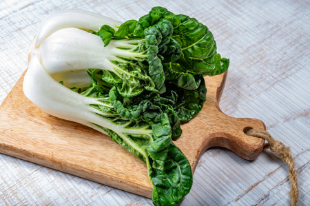 Young organic white bok choy or bak choi Chinese cabbage ready to cook, healing foodの写真素材