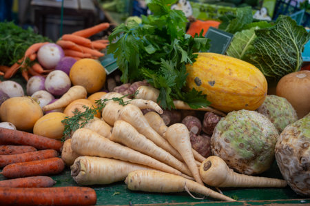 Farmers outdoor market with seasonal winter organic root vegetables, pumpkins, cool, carrotsの写真素材