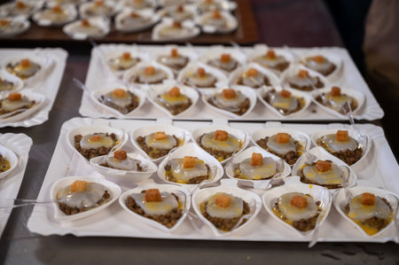 Degustation appetizers for visitors made by great chefs of haute cuisine French restaurants, winter festival, Avenue de Champagne, Epernay, Franceの写真素材