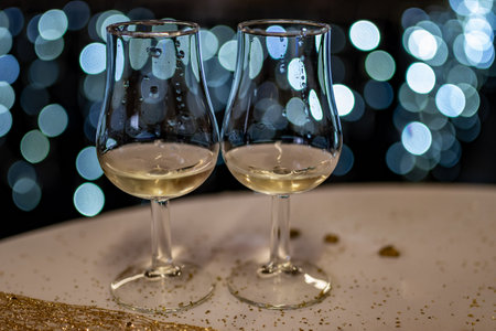 Small tasting glasses of sparkling wine champagne on winter festival in December, Avenue de Champagne, Epernay, Champagne region, Franceの写真素材