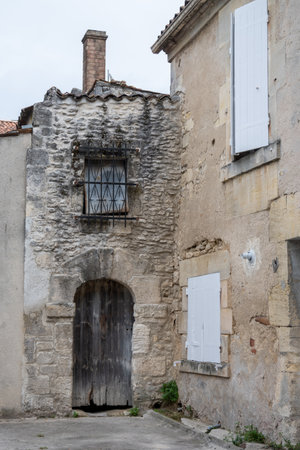 View on old streets and houses in Cognac white wine region, Charente region, walking in town Cognac with strong spirits distillation industry, Grand Champagne, Franceの写真素材