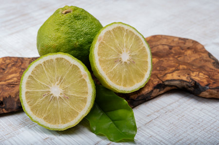 Fresh ripe bergamot orange fruits, fragrant citrus used in earl gray tea, medicine and spa treatments, close upの写真素材