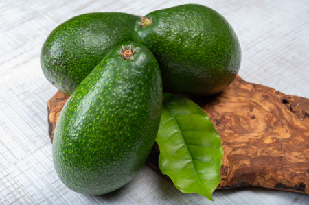 Green ripe avocado fruits from organic avocado plantation - healthy vegan and vegetarian foodの写真素材