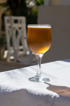 Lunch with cold beer in Spanish outdoor cafe, sunny dayの写真素材