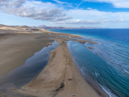 Aerial view on sandy dunes and blue turquoise water of Sotavento beach, Costa Calma, Fuerteventura, Canary islands, Spain in winterの写真素材
