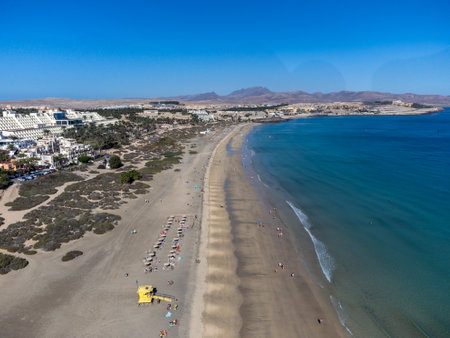 Aeriav view on sandy dunes, beach and Costa Calma, Fuerteventura, Canary islands, Spain in winter, sunny winter dayの写真素材